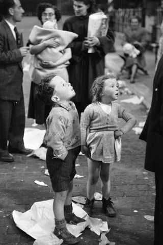 Two young friends at a party in Morpeth Street in London's East End, to celebrate the coronation of Queen Elizabeth II