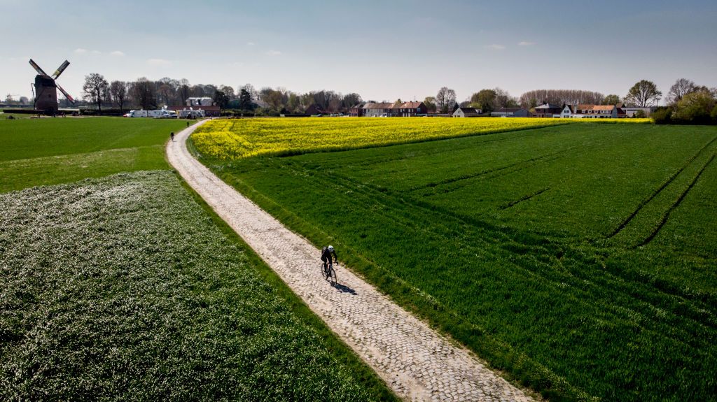 Riders get a glimpse of a dry and dusty Paris-Roubaix route