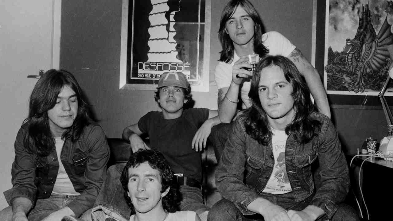 AC/DC posing for a photograph in 1976