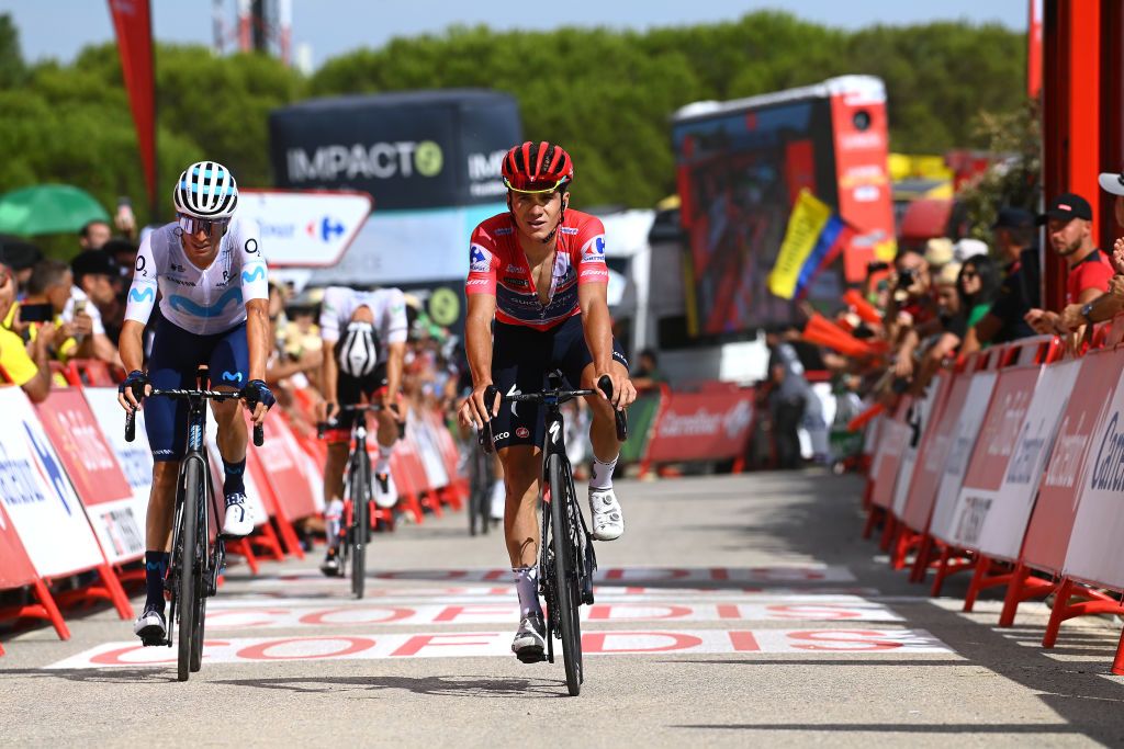 MONASTERIO DE TENTUDA SPAIN SEPTEMBER 07 LR Enric Mas Nicolau of Spain and Movistar Team and Remco Evenepoel of Belgium and Team QuickStep Alpha Vinyl Red Leader Jersey cross the finish line during the 77th Tour of Spain 2022 Stage 17 a 1624km stage from Aracena to Monasterio de Tentuda 1095m LaVuelta22 WorldTour on September 07 2022 in Monasterio de Tentuda Spain Photo by Tim de WaeleGetty Images