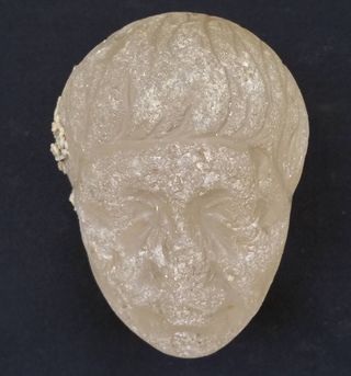 The divers also discovered a crystal carving of a head from the Roman era.