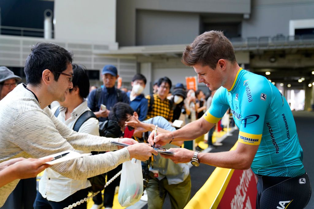 Riders do karate and football-darts before the 2019 Saitama Tour de France criterium