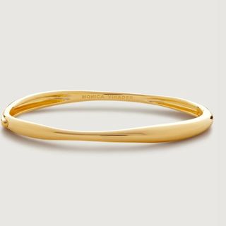 flat lat image of gold bangle 