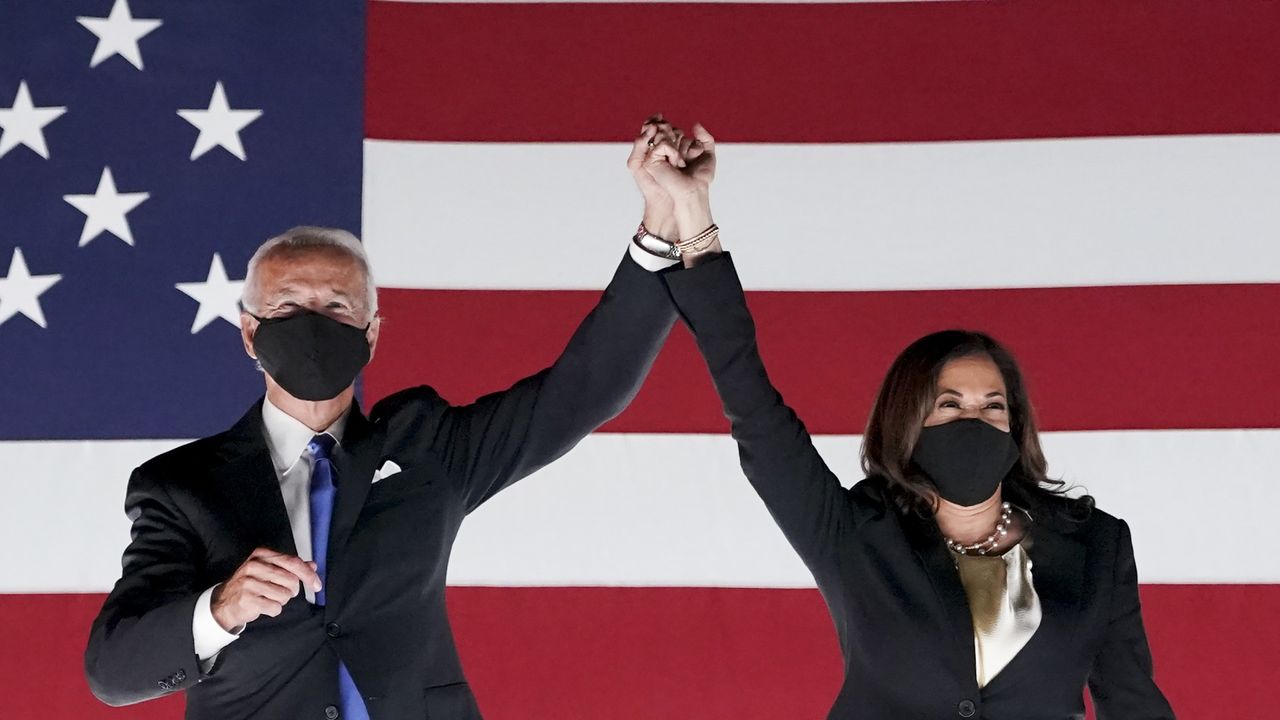 Joe Biden, Democratic presidential nominee, left, and Senator Kamala Harris, Democratic vice presidential nominee outside the Chase Center during the Democratic National Convention in Wilmington, Delaware, U.S., on Thursday, Aug. 20, 2020. 