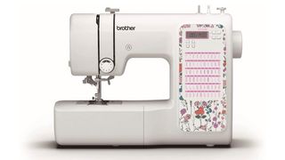 Best sewing machines for beginners; a white sewing machine with a floral decoration