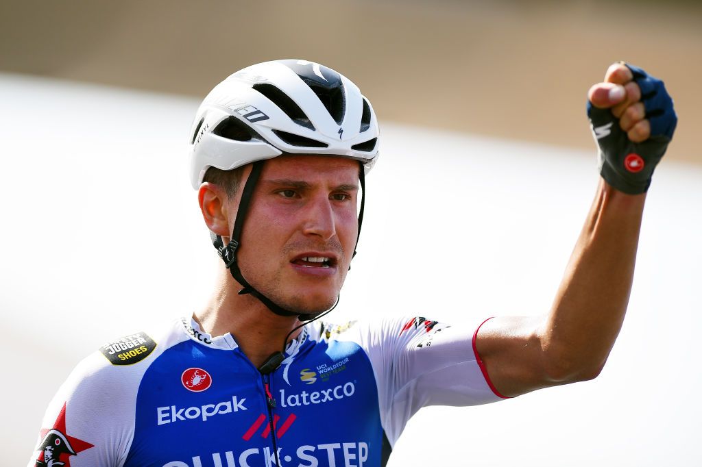 MUSCAT OMAN FEBRUARY 13 Fausto Masnada of Italy and Team QuickStep Alpha Vinyl celebrates winning during the 11th Tour Of Oman 2022 Stage 4 a 1195km stage from Al Sifah to Mucat TourofOman on February 13 2022 in Muscat Oman Photo by Dario BelingheriGetty Images