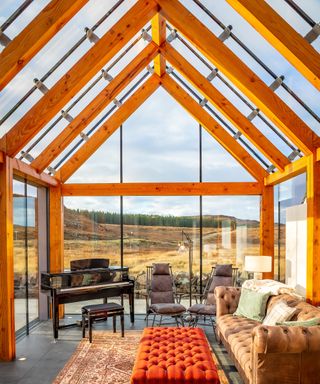 inside of douglas fir frame extension with large glazed ceiling panels and wall panels