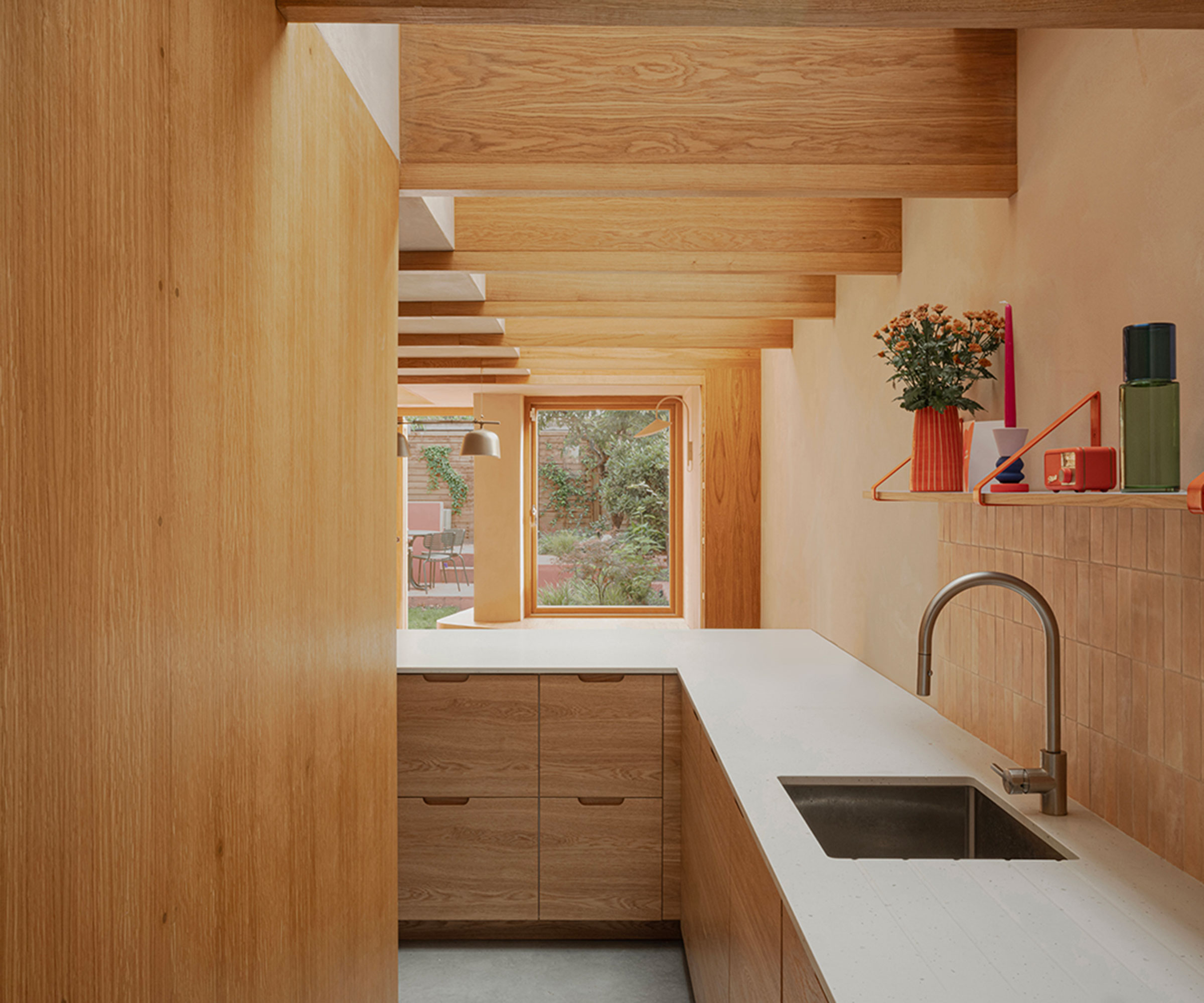 modern wooden kitchen with louvred ceiling