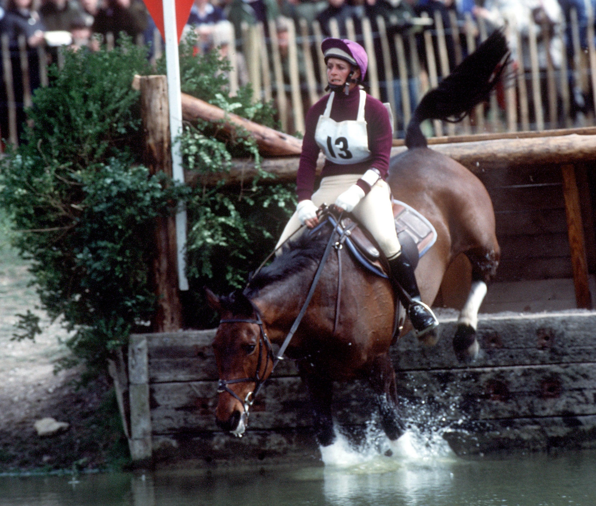 Good cross-country jumping position horse jumping into water