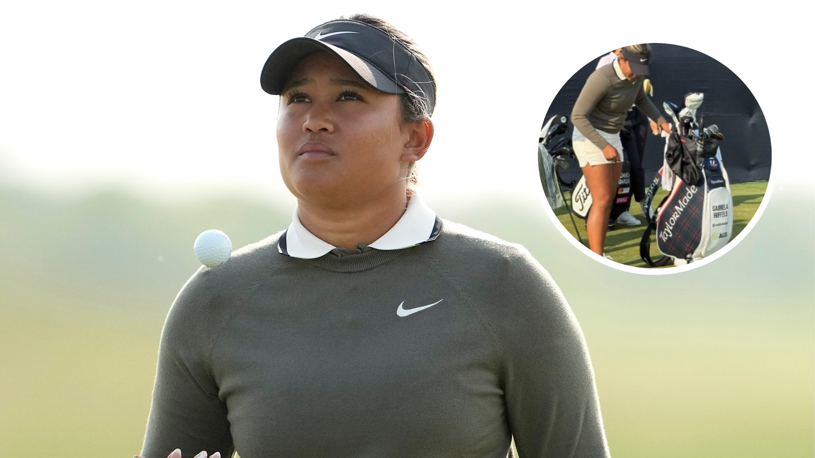 Amari Avery walks to the tee and looks at her golf bag