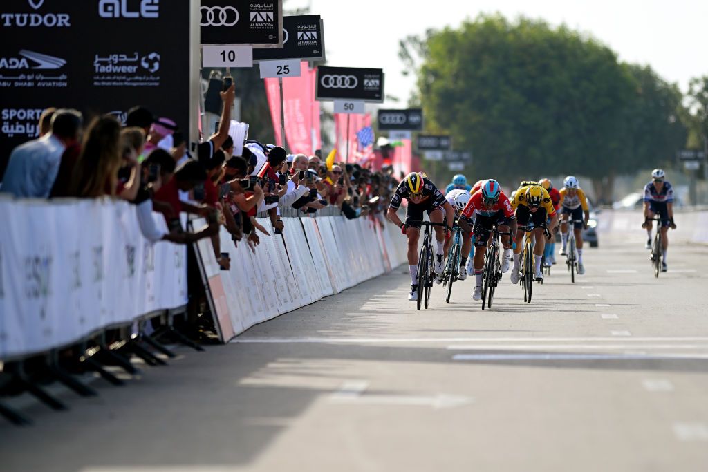 Tim Merlier and Caleb Ewan sprint to the line on stage 1 of the UAE Tour