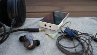 Astell&Kern Activo P1 with headphones, IEMs, and true wireless earbuds