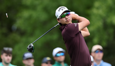 Min Woo Lee strikes a driver off the tee