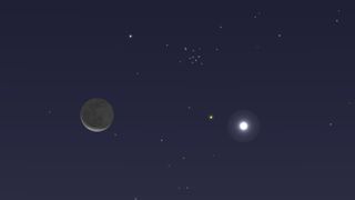 See the moon, Venus and the Beehive star cluster in the early morning sky on Sept. 14, 2020.