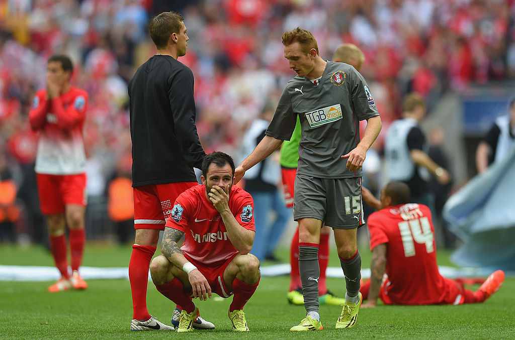Leyton Orient players react to their 2014 League One play-off final defeat