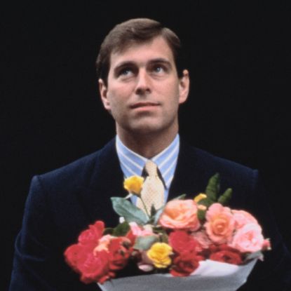 Prince Andrew arrives with flowers after the birth of his first daughter, Princess Beatrice, London, 9th August 1988