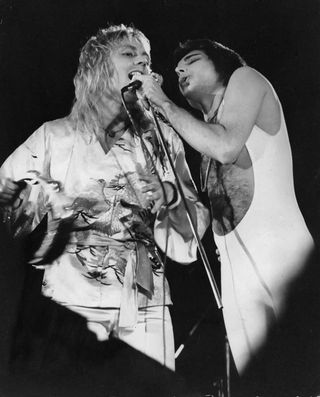 Roger Taylor and Freddie Mercury of British rock band Queen perform a free concert in London's Hyde Park, 18th September 1976