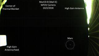 Annotated version of the MarCO Mars photo of Oct. 2, 2018, identifying the various spacecraft parts visible in the image.