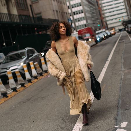 woman walking in leather boots