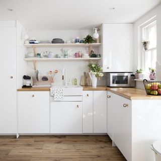 kitchen with wooden flooring and cabinet