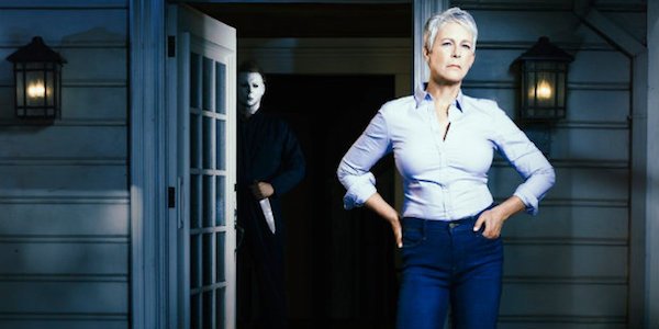 Jamie Lee Curtis with Michael behind her