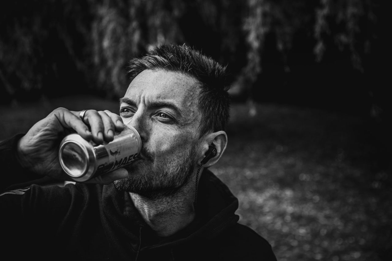 Dries Devenyns has a beer after a mountain bike ride in the woods