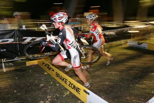 Carrie Cash-Wooten and Kathy Sherwin chasing