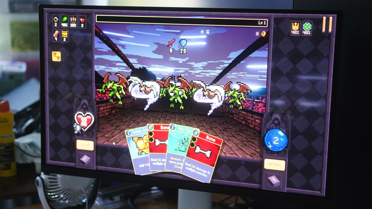 Close up of BenQ Mobiuz EX271UZ monitor with Vampire Crawlers gameplay on screen.
