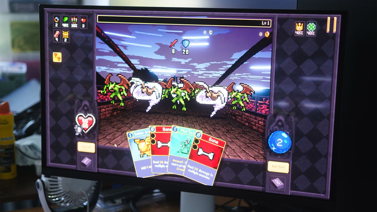 Close up of BenQ Mobiuz EX271UZ monitor with Vampire Crawlers gameplay on screen.