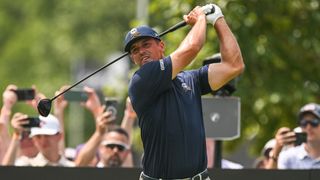 Bryson DeChambeau (USA) of Crushers GC watches his tee shot during the final round of LIV Golf Nashville on June 23, 2024, at The Grove Golf Course in College Grove, TN.