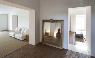 Interior design of room with mirror on floor