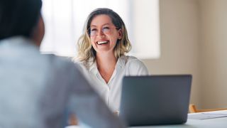 Woman talking with a colleague