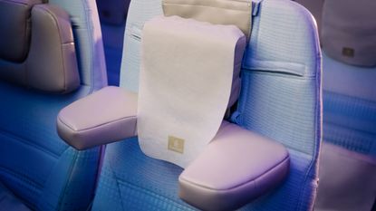 The world’s first U-Dream headrest installed on an Emirates Economy Class seat, highlighting the adjustable side cushions designed to provide personalised neck and head support