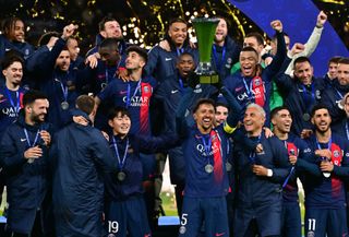 Paris Saint-Germain celebrate winning the Trophy of Champions in January 2024.