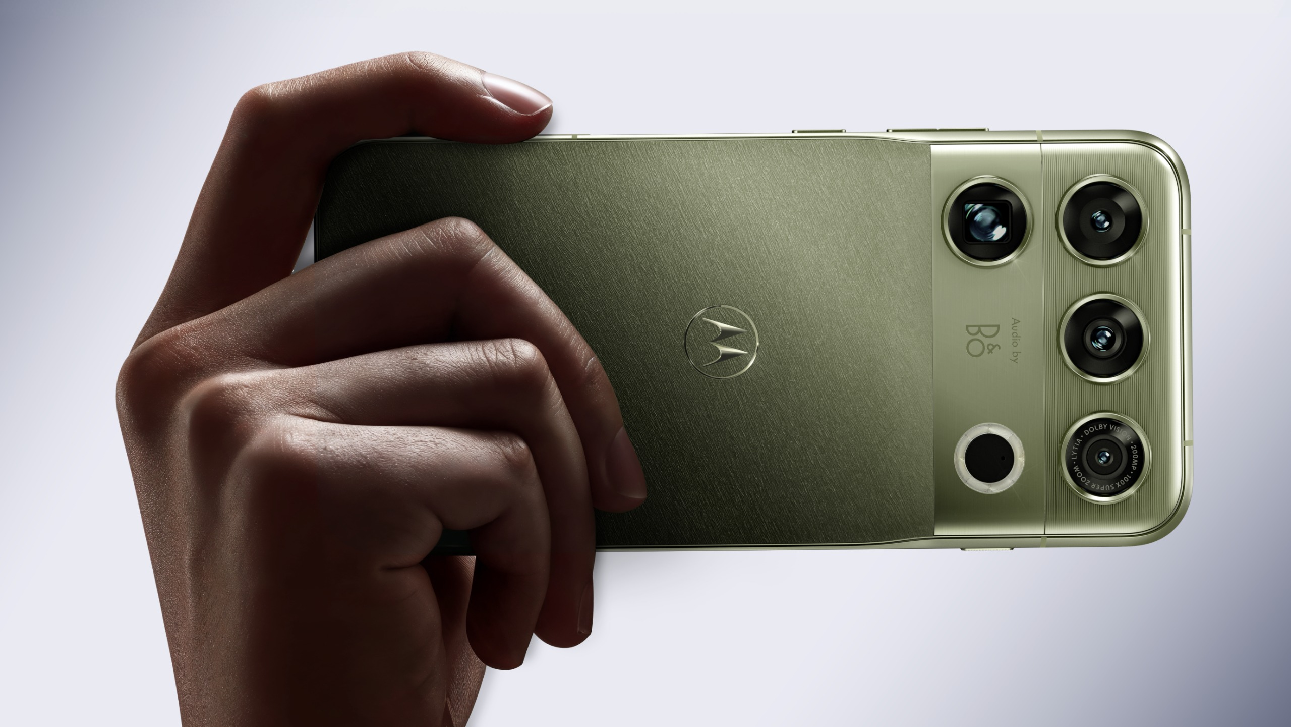 The Motorola Signature 27 being held in the hand