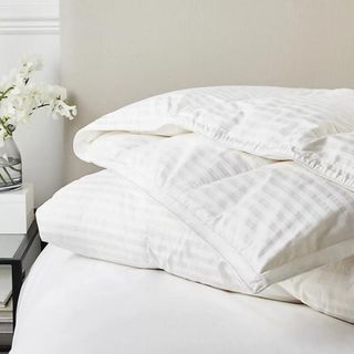 White Company duvet on a white bed in bedroom