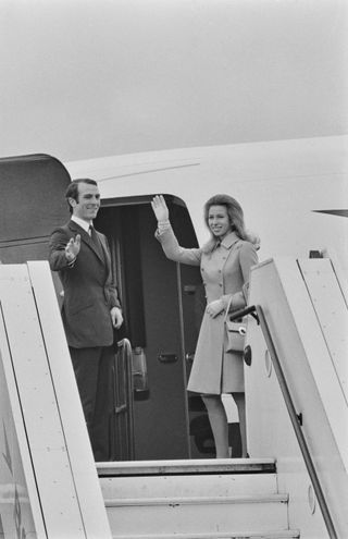 Princess Anne and Mark Phillips leave Heathrow Airport in London for their honeymoon in the West Indies, UK, 15th November 1973.