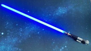 SabersPro Obi Wan Lightsaber on a starry background with the blade ignited.