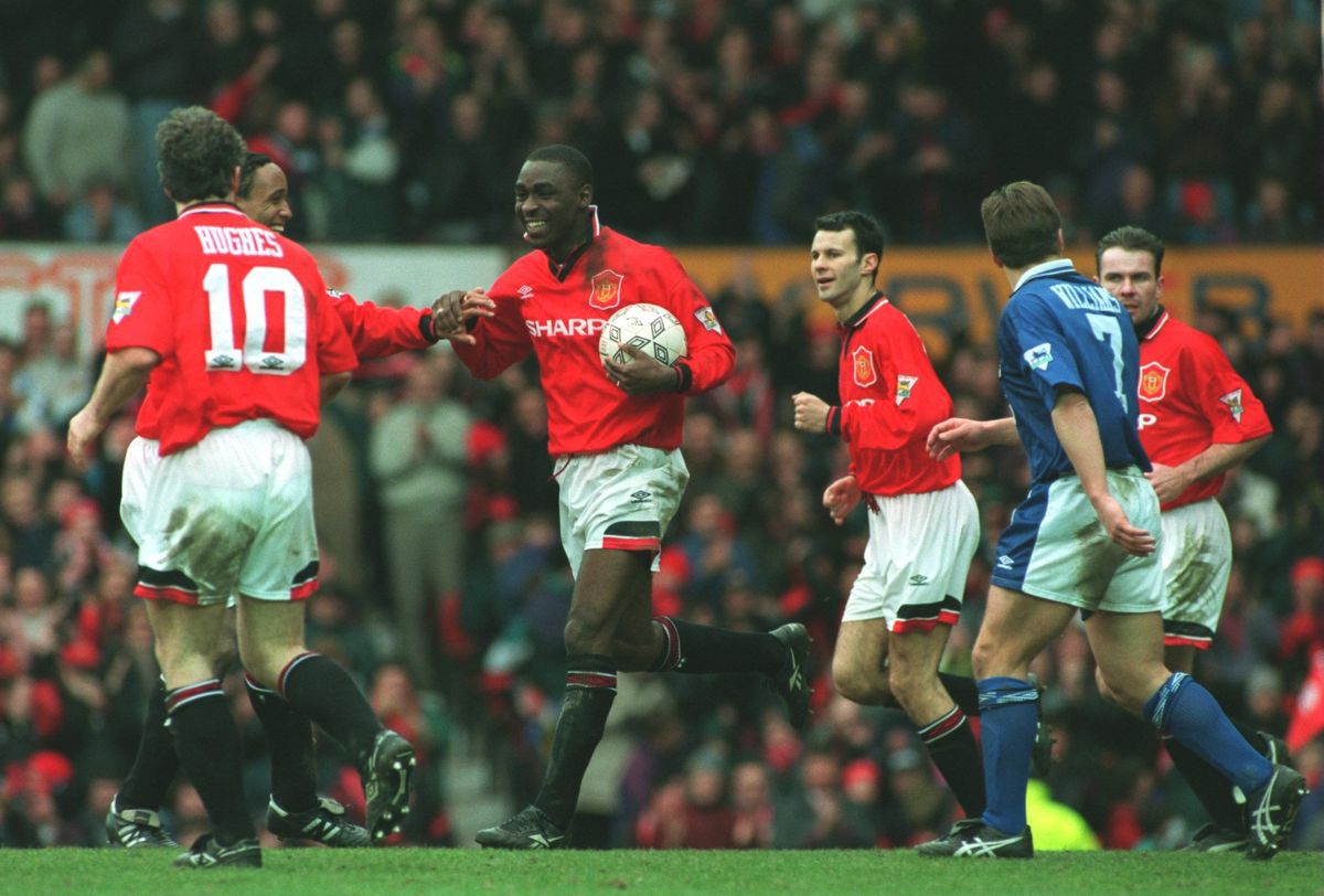 Andy Cole of Manchester United celebrates after scoring his second of five goals against Ipswich Town during the Premier League match at Old Trafford, March 1995