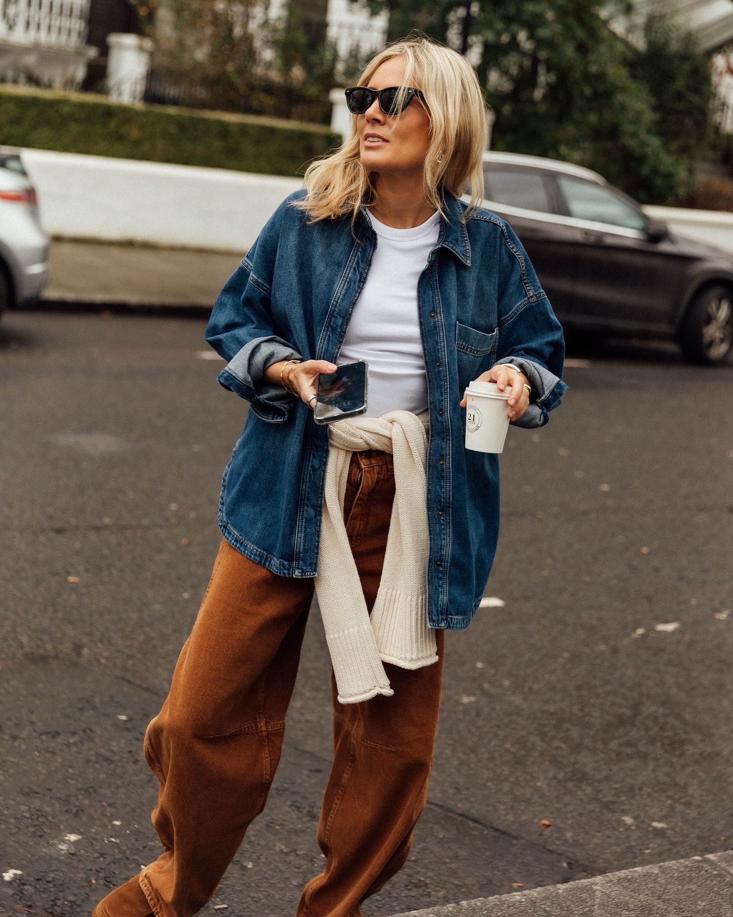 Lucy Williams wears brown jeans