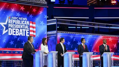 Republican debate stage with candidates Republican Presidential Debate at the Adrienne Arsht Center for the Performing Arts on November 8, 2023. Left to right are former New Jersey Gov. Chris Christie, former United Chris Christie, Nikki Haley, Ron DeSantis, Vivek Ramaswamy and Tim Scott.