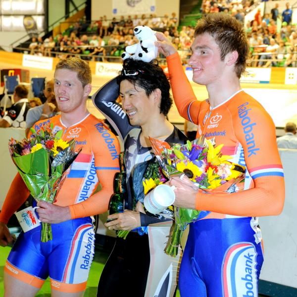Watanabe of Japan sharing a joke with the Dutch sprinters
