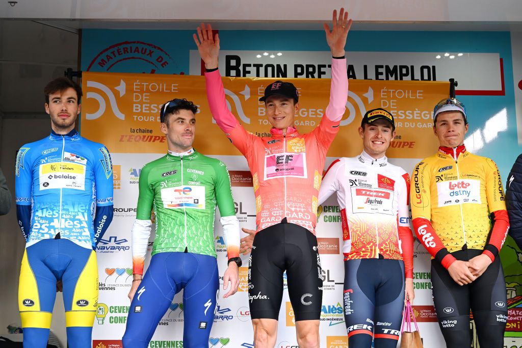 ALES FRANCE FEBRUARY 05 LR Vito Braet of Belgium and Team Flanders Baloise Blue Mountain Jersey Pierre Latour of France and Team TotalEnergies green jersey Neilson Powless of The United States and Team EF Education Easypost Orange Leader Jersey Mattias Skjelmose of Denmark and Team TrekSegafredo White best young jersey and Arnaud De Lie of Belgium and Team Lotto Dstny Yellow Points Jersey celebrate at podium during the 53rd Etoile de Besseges Tour Du Gard 2023 Stage 5 a 1066km individual time trial stage from Ales to Ales EDB2021 on February 05 2023 in Ales France Photo by Luc ClaessenGetty Images