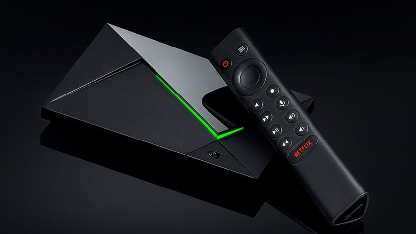 An Nvidia Shield TV Pro streaming device on a mirrored black background