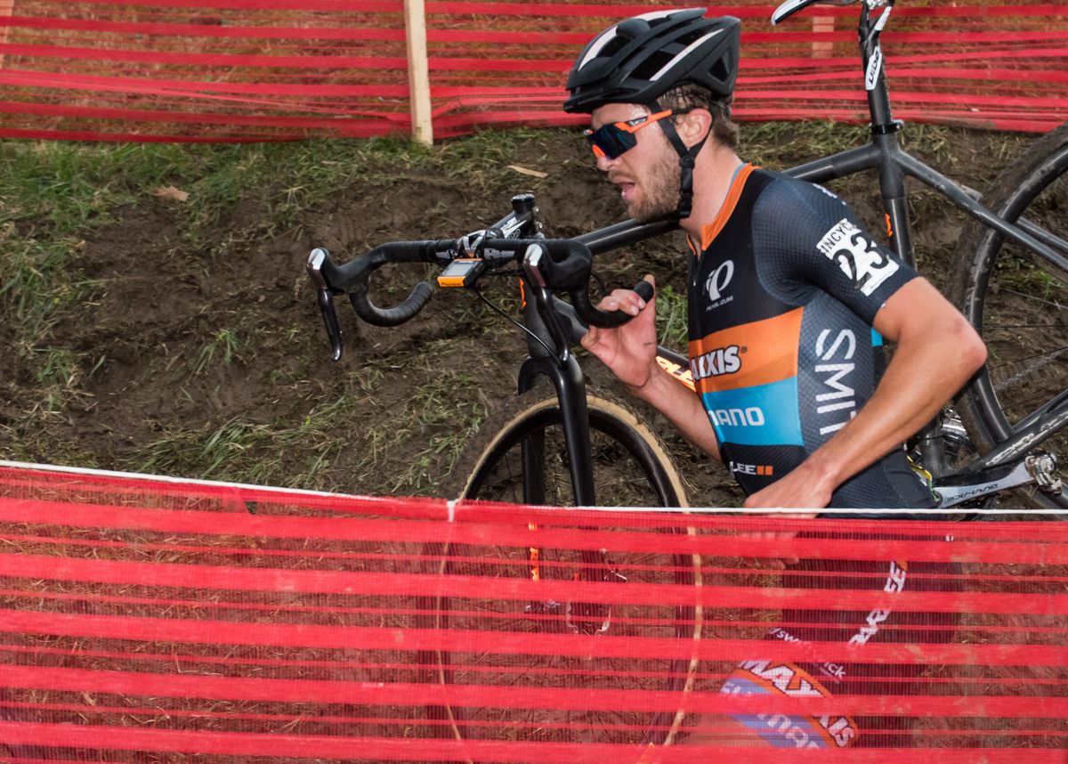 Danny Summerhill carrying his bike