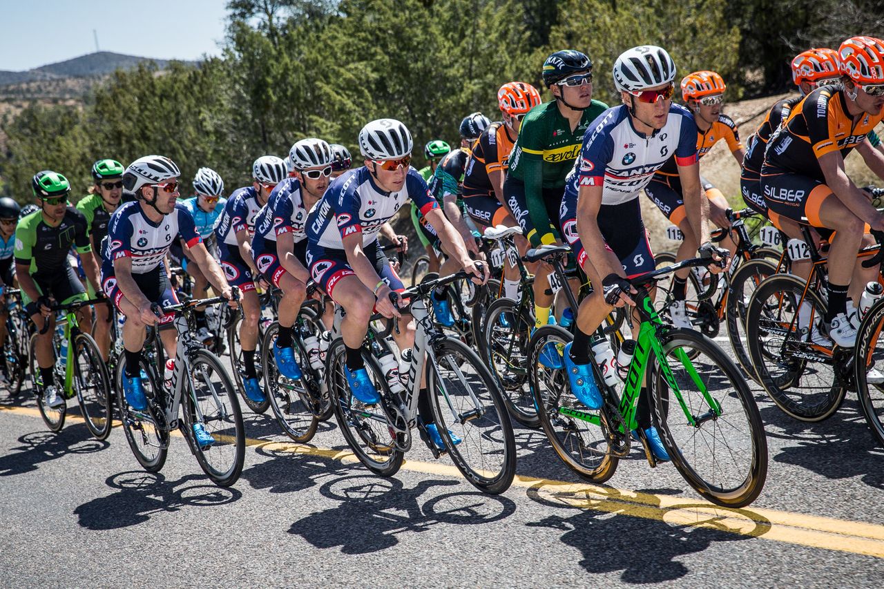 Canyon riders move towards the front of the field.