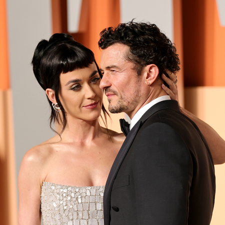 Katy Perry and Orlando Bloom attend the 2025 Vanity Fair Oscar Party Hosted By Radhika Jones at Wallis Annenberg Center for the Performing Arts on March 02, 2025 in Beverly Hills, California.