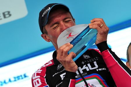 Matija Kvasina (Synergy Baku) kisses his winner's trophy at Tour of Croatia