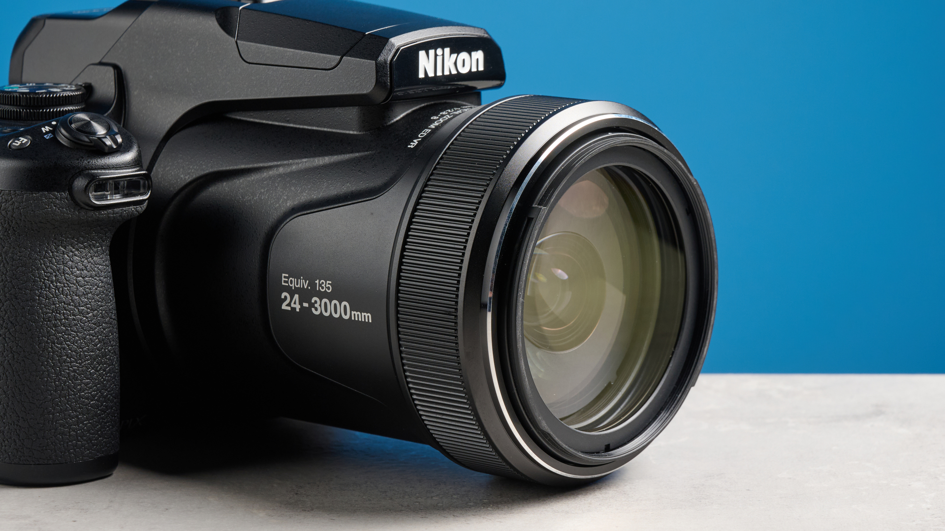 A black Nikon Coolpix P1100 digital camera