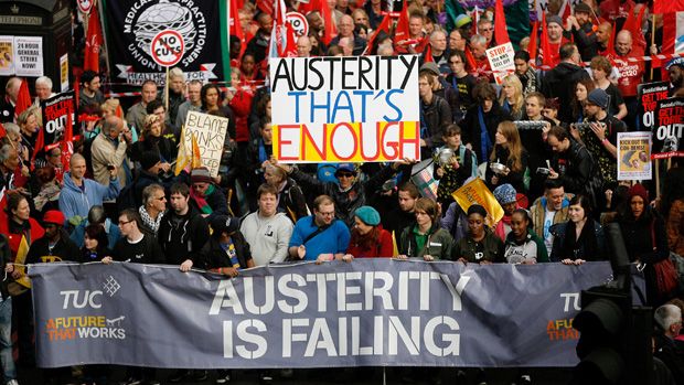 LONDON, UNITED KINGDOM - OCTOBER 20:Demonstrators take part in a TUC march in protest against the government&amp;#039;s austerity measures on October 20, 2012 in London, England. Thousands of people a